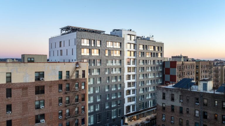 An outside shot of YP Senior Residence, a 9-story rental building.