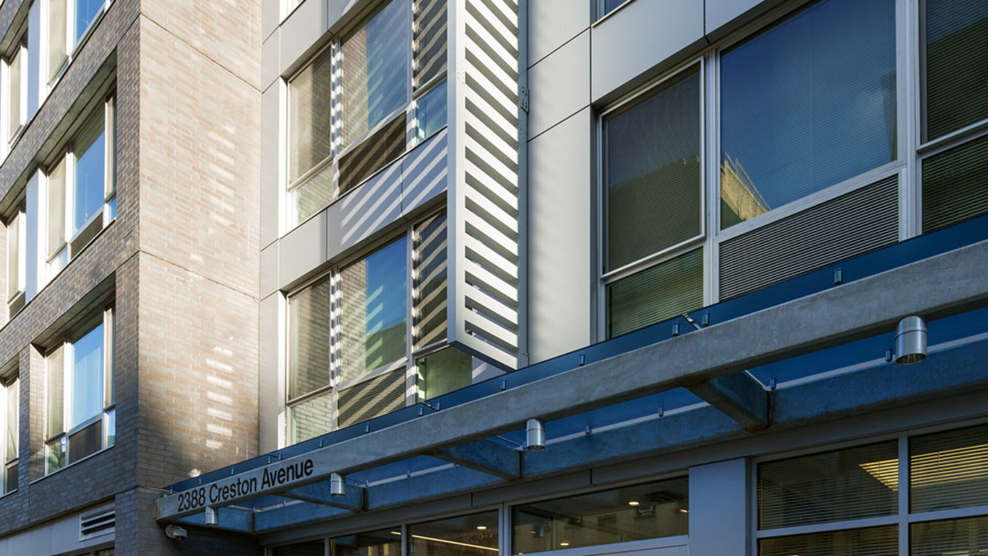 Family entering building