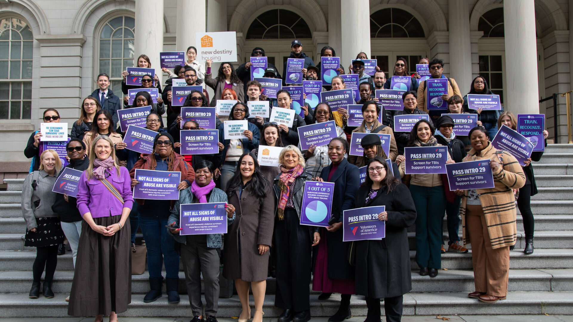 VOA-GNY staff joins City Council Majority Leader Amanda Farías on the steps of City Hall.