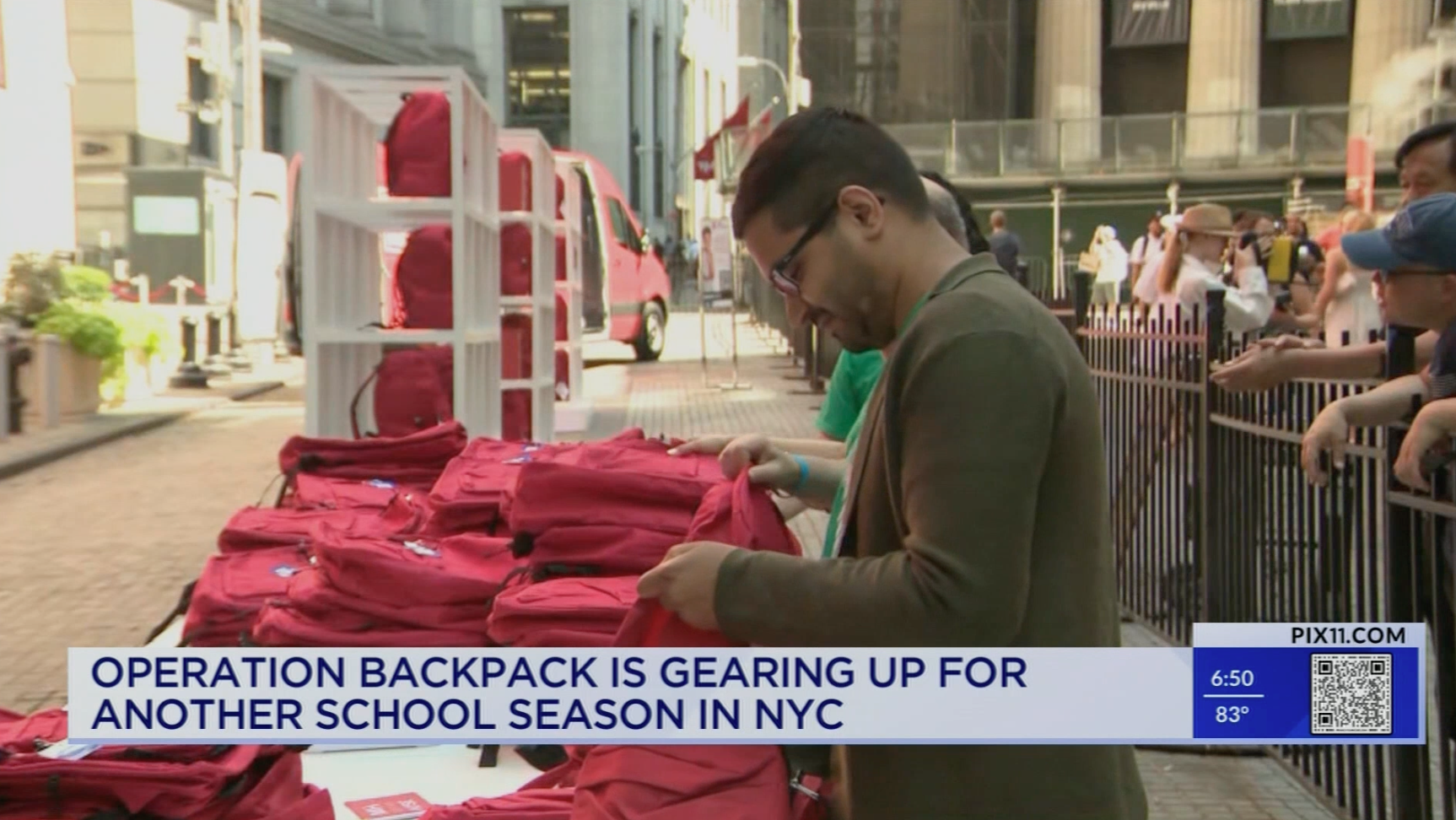 A still of a PIX11 broadcast covering Operation Backpack at New York Stock Exchange.
